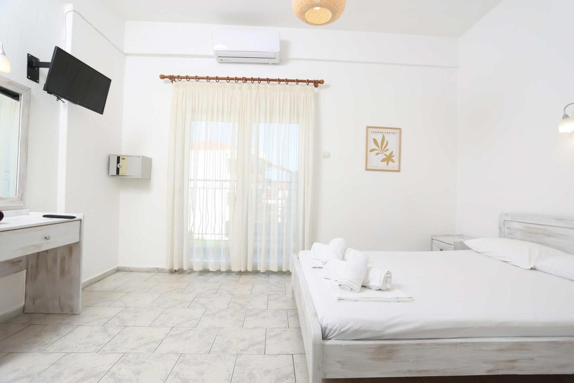 Spanos Apartments Anna'S Lodge Polychrono Bagian luar foto